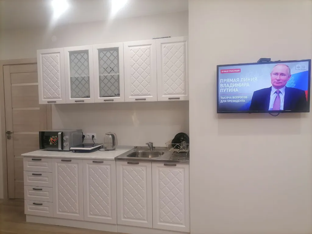 Квартира с панорамным видом на лес в центре города