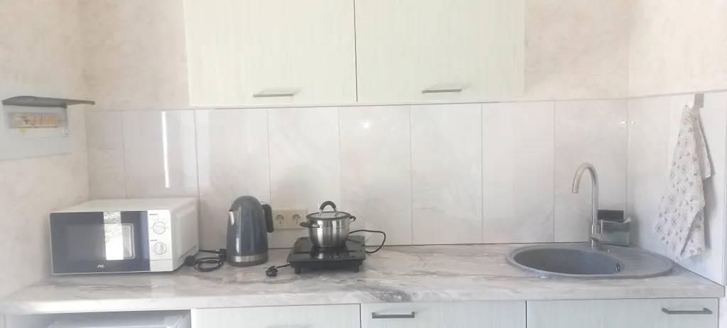 Гуамкаюг. Дом с купелью и видом на горы