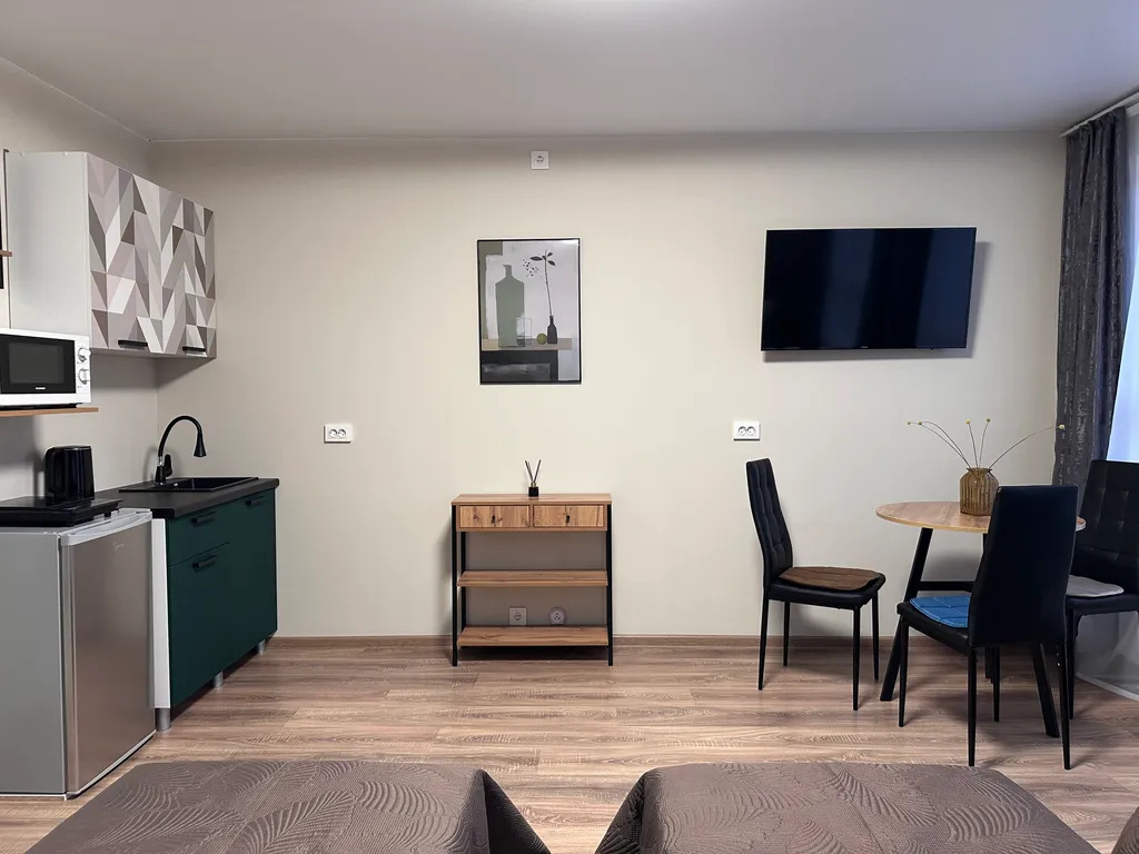 Студия с тремя раздельными кроватями