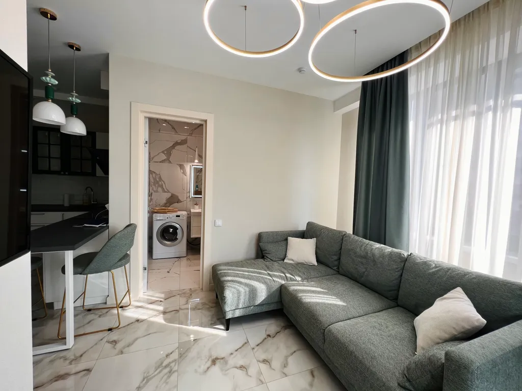 Апартаменты в вечнозелёном парке у моря