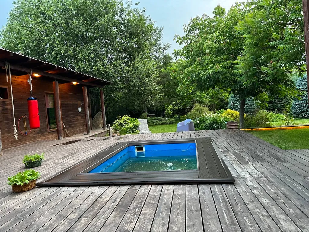 Коттедж Уютный деревянный дом с ландшафтным садом у озера — Шеметово