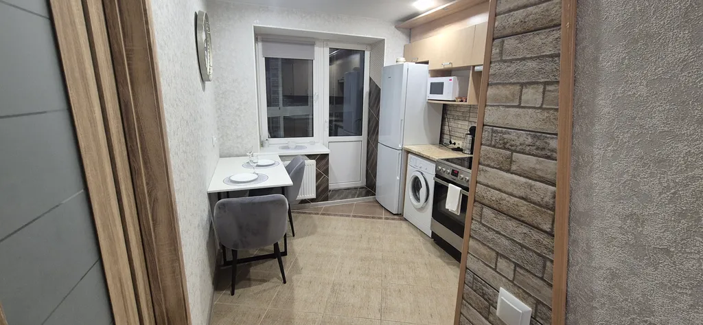 Уютная квартира в центре города с видом на колесо обозрения