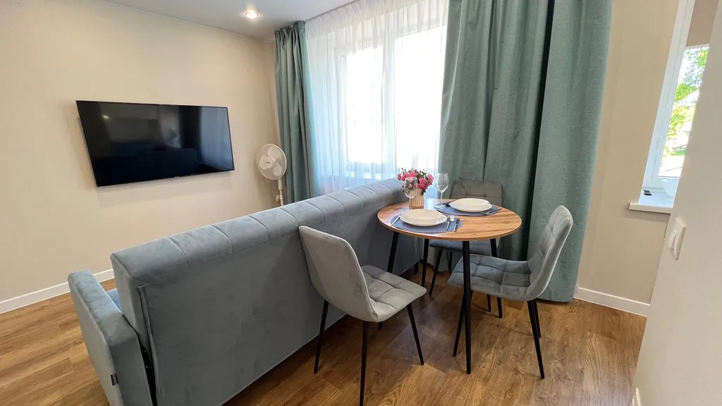 Апартамент у часовой башни и дома гильдии