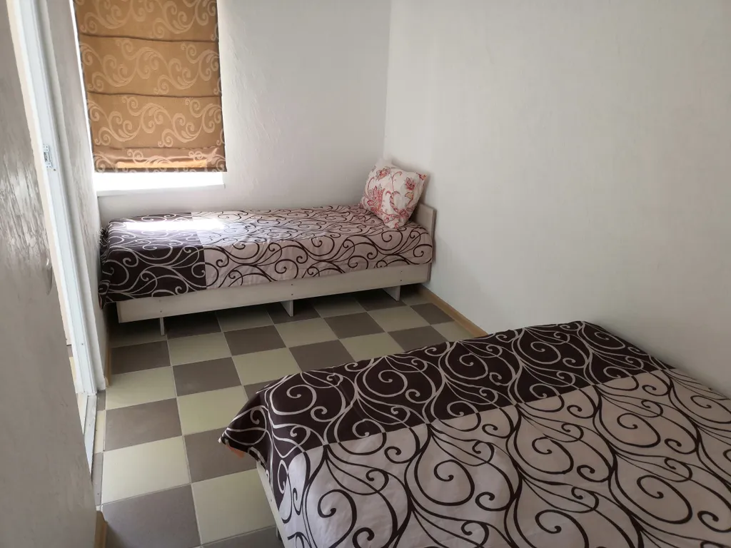 Апартаменты двухкомнатные, пятиместные, первый этаж