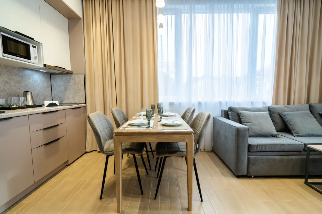 Семейный номер с видом на горы и кухонной зоной