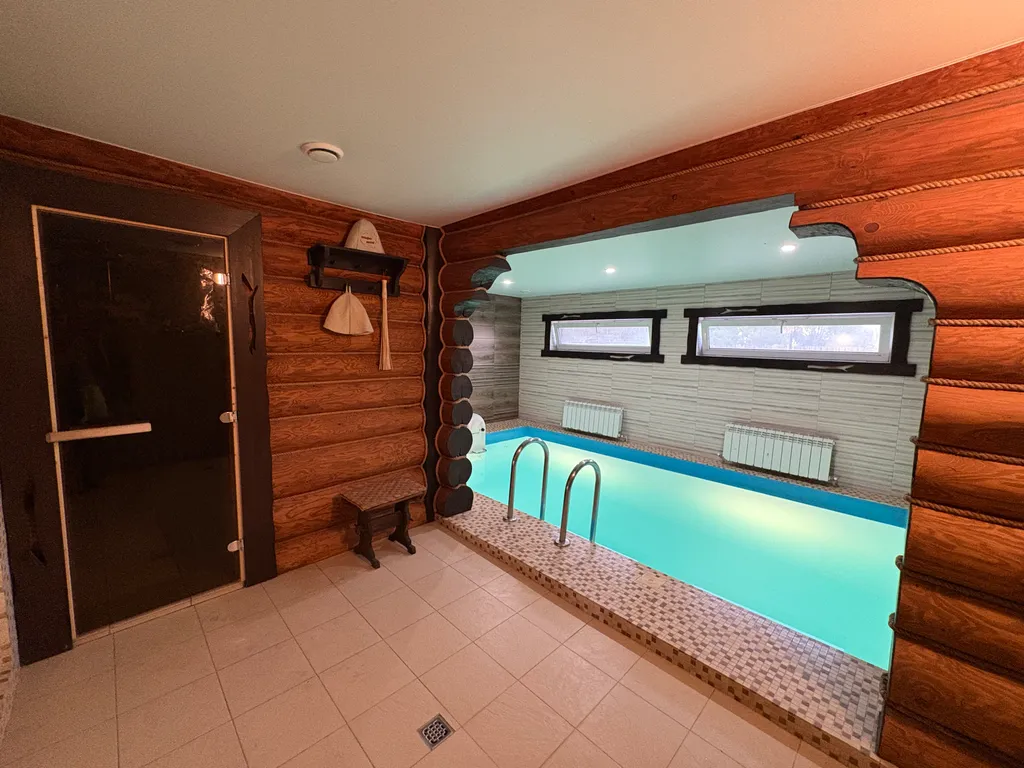 Загородный дом с бассейном и парной на дровах