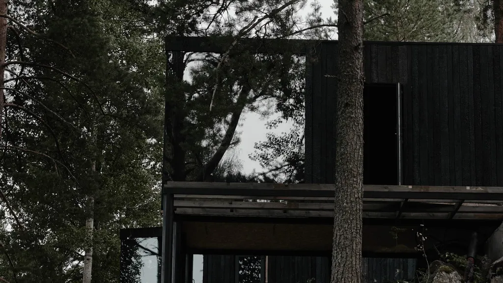 Дом на скале с панорамными окнами на реку Вуоксу