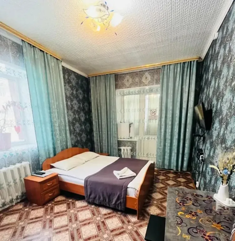 Квартира Люкс с двуспальной кроватью — аренда посуточно в Алдан