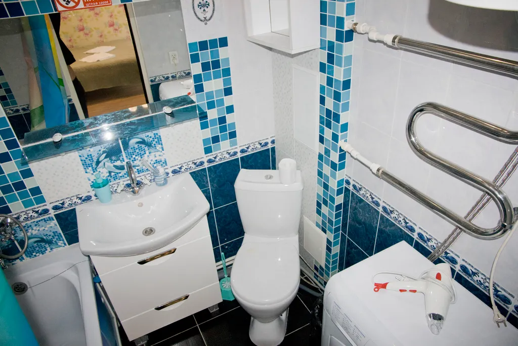 Однокомнатная с зеленым диваном и теплым полом