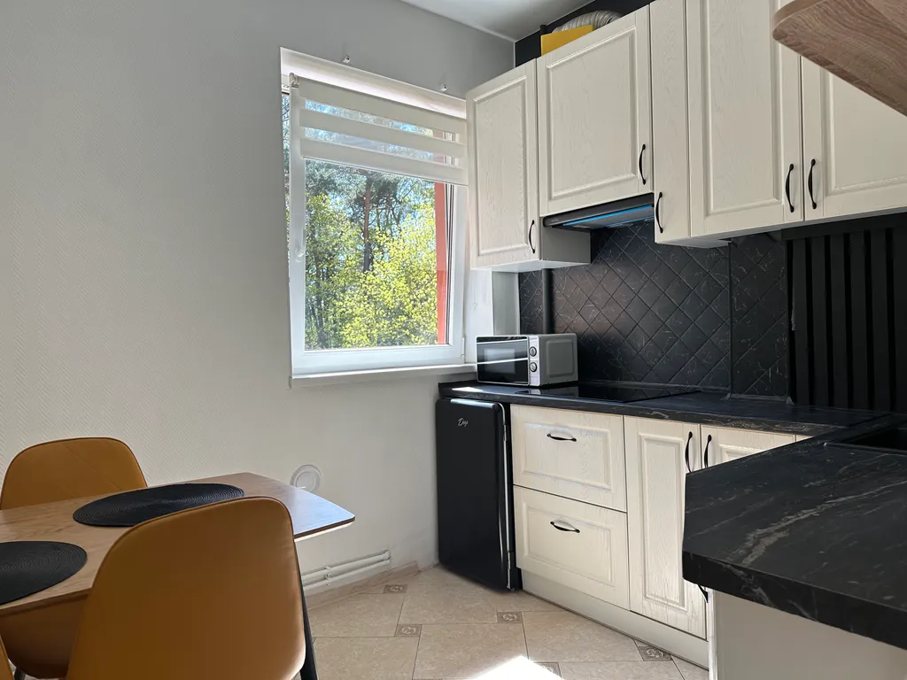 Апартамент в окружении сосен и видом на кирху