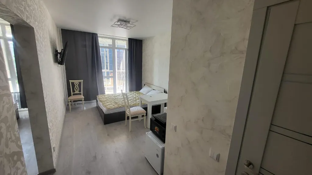 Уютная квартира в новом доме с панорамными окнами