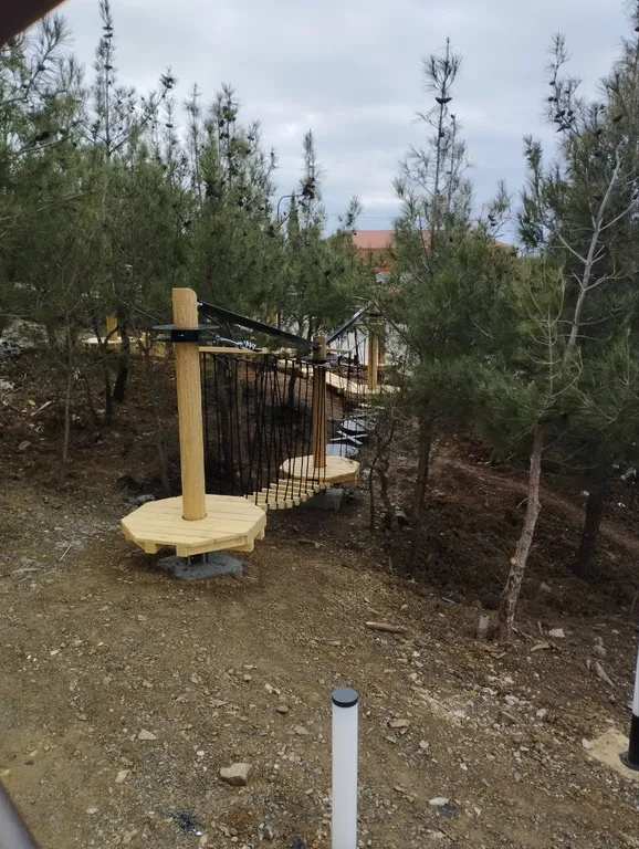 Квартира-студия в окружении хвойного леса и гор.