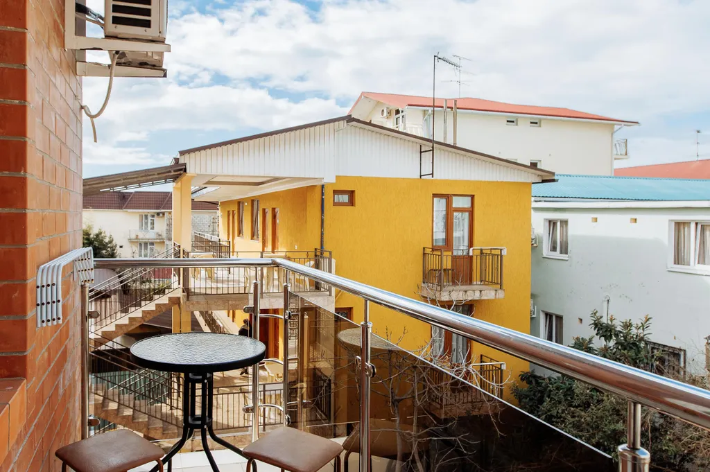 Трёхместный номер Комфорт с балконом