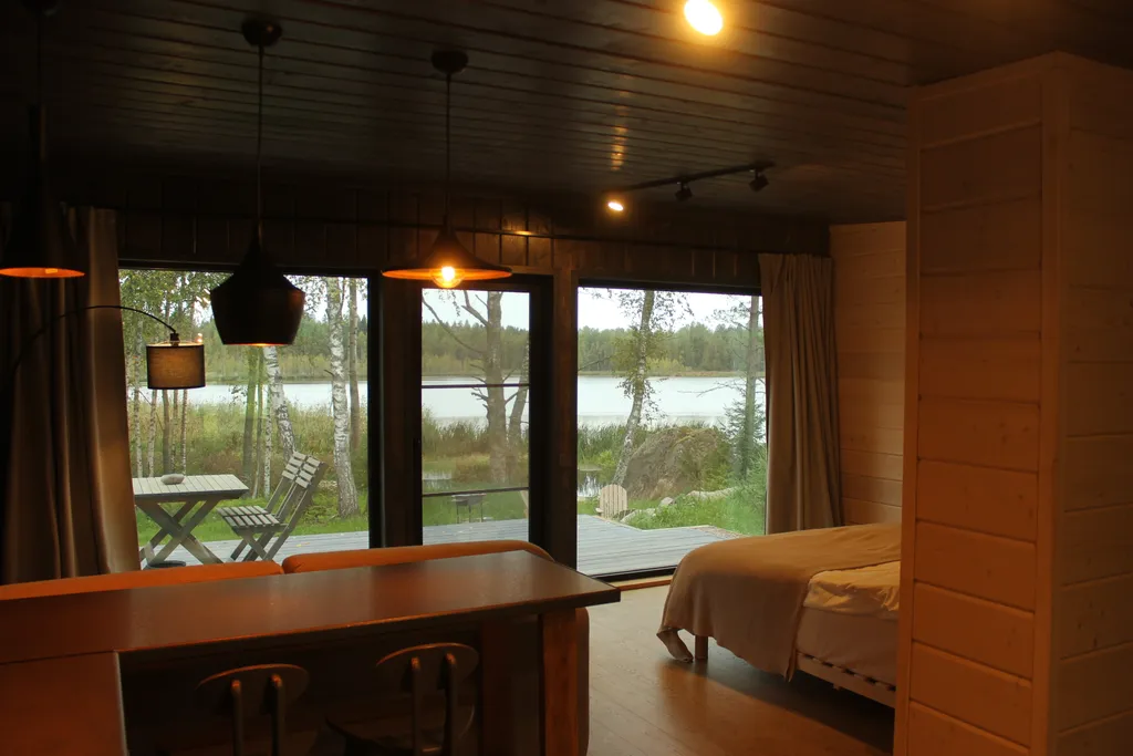 Коттедж Вилла Kaksi с видом на озеро и каменной зоной барбекю — Приозерск