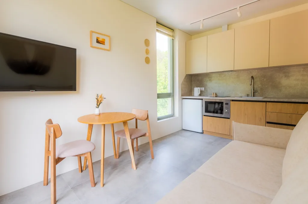 1-е апартаменты с видом на горы и бассейном