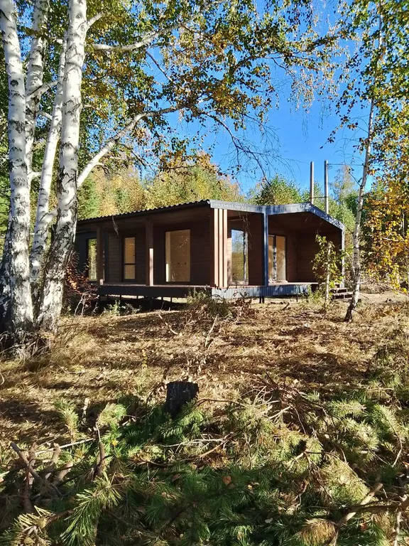 Дом в лесу на берегу озера Увильды