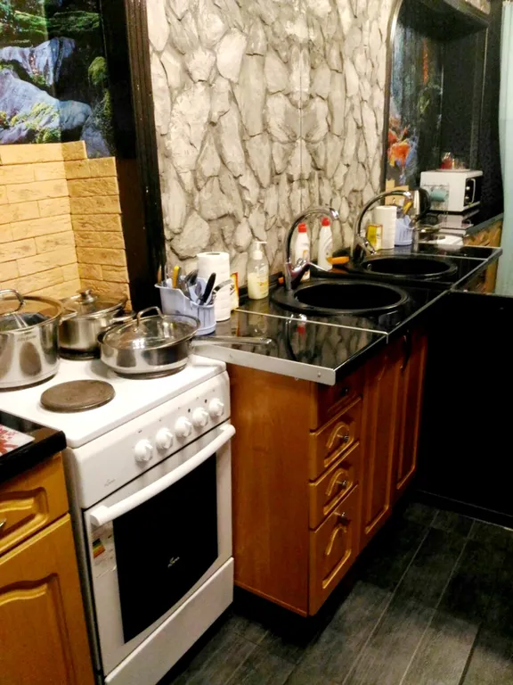 Однокомнатная квартира с балконом и видом на город и залив, 24 часа