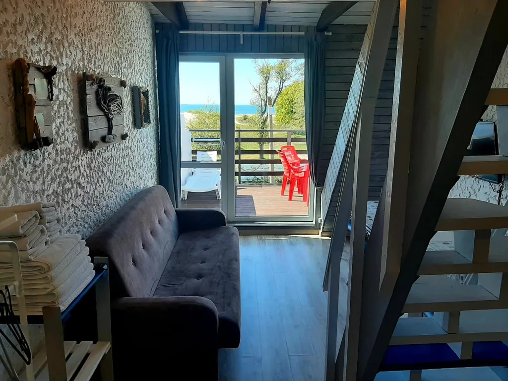 Двухуровневый номер с видом на море