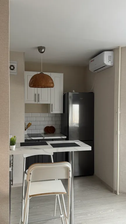 Уютная студия на высоте птичьего полёта