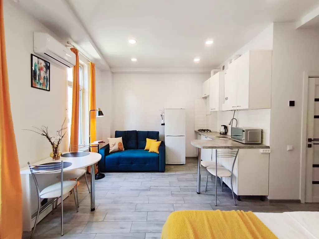 Современный апартамент-студия с видом на горы