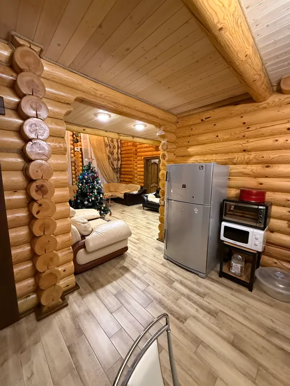 Двухэтажный дом из сруба а Теберде с баней с видом на горы и реку