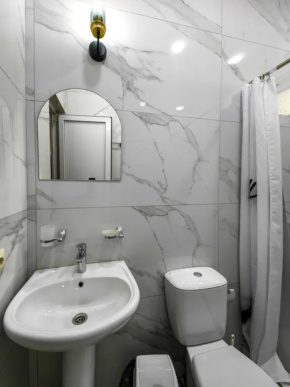 Апартаменты с отдельной спальней и кухней - гостиной