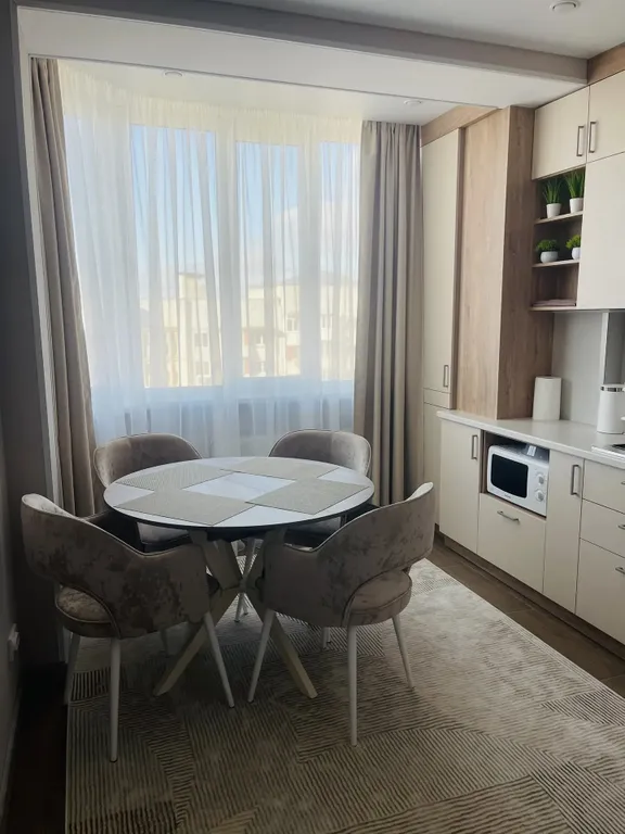 Уютная квартира в тихом районе с развитой инфраструктурой.