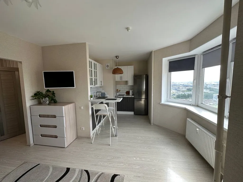 Уютная студия на высоте птичьего полёта