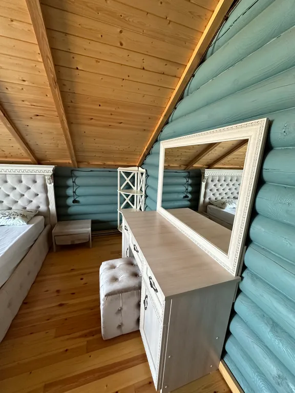 Дом из бруса на берегу моря с зоной барбекю и собственной парной