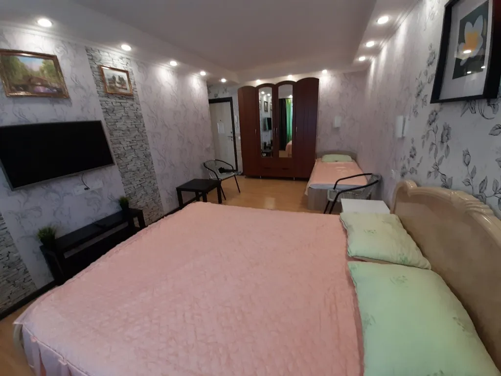 Квартира с балконом и видом на город