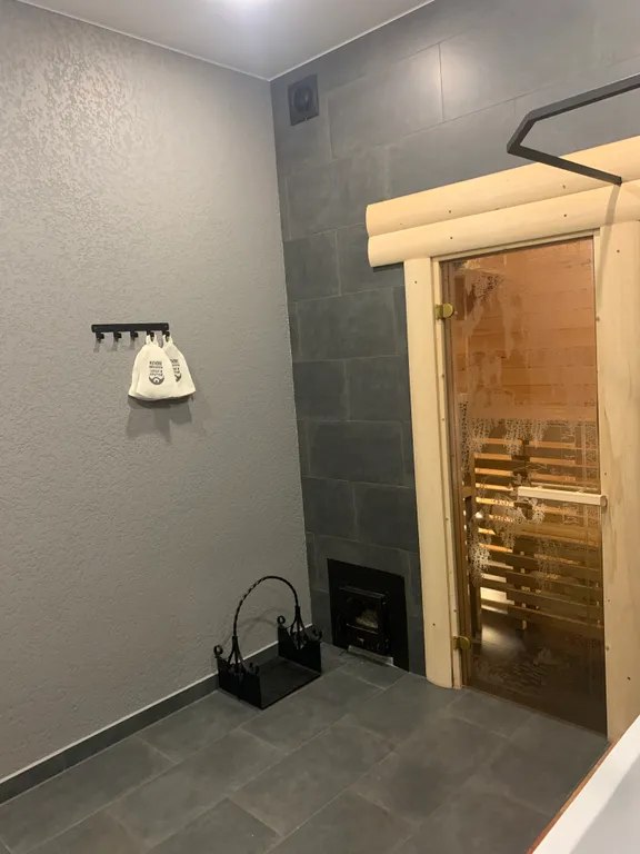 Апартаменты с баней, камином, мангальной зоной и террасой на крыше