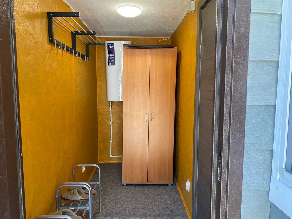 Дом с террасой на берегу реки Кобонка