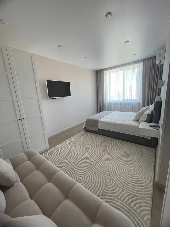 Уютная квартира в тихом районе с развитой инфраструктурой.