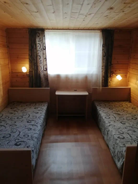 Дом на берегу с баней и лодкой