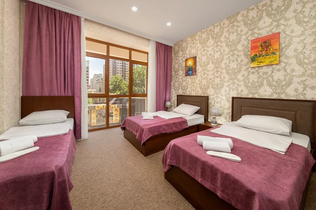 Квартира Улучшенный трехместный номер — аренда посуточно в Баку