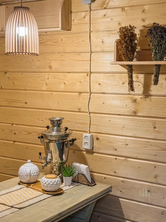 Дом в лесной сказке с видом на закат