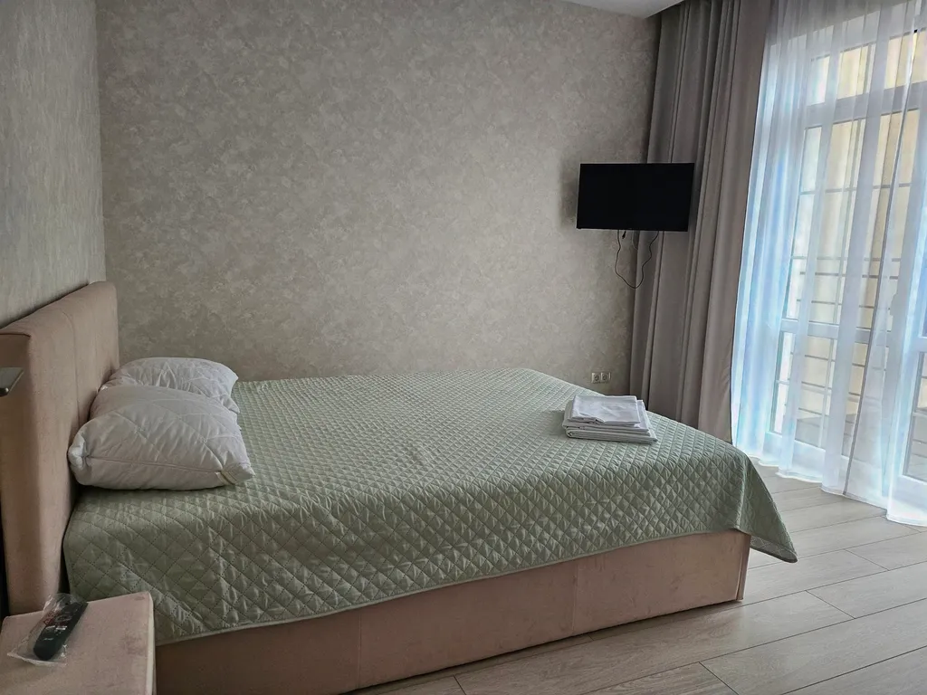 Домик у моря с зоной барбекю