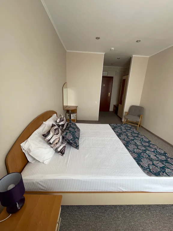 Уютный двухместный номер с двуспальной кроватью и видом на море