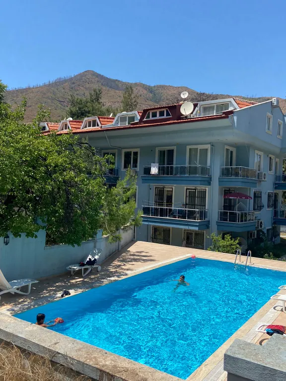 Апартамент с бассейном во дворе в райском уголке Ичмелера