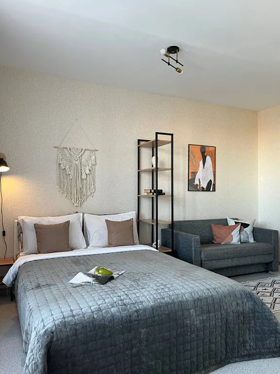 Уютная студия с видом на город