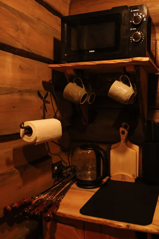 Бревенчатый дом-баня в стиле охотничьего домика