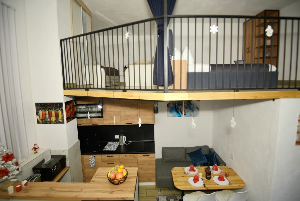 Комфортный двухуровневый апартамент в элитном комплексе Колизей