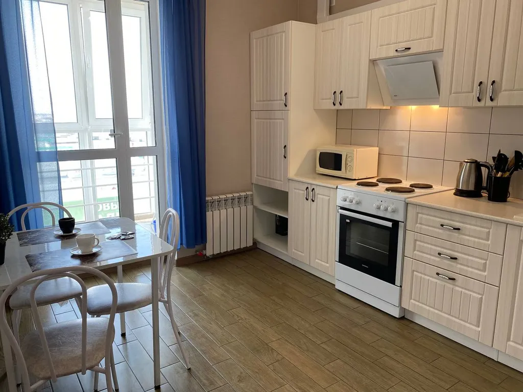 Уютная квартира с ортопедическим матрасом и панорамным балконом