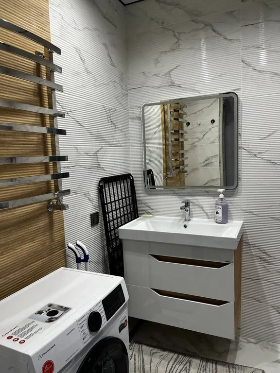 Двухкомнатная квартира с дизайнерским ремонтом