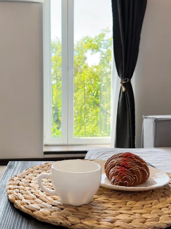 Студия с балконом в центре