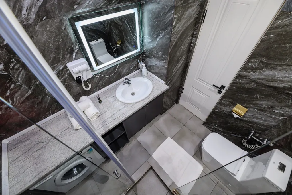 Апартаменты с террасой с видом на город и горы