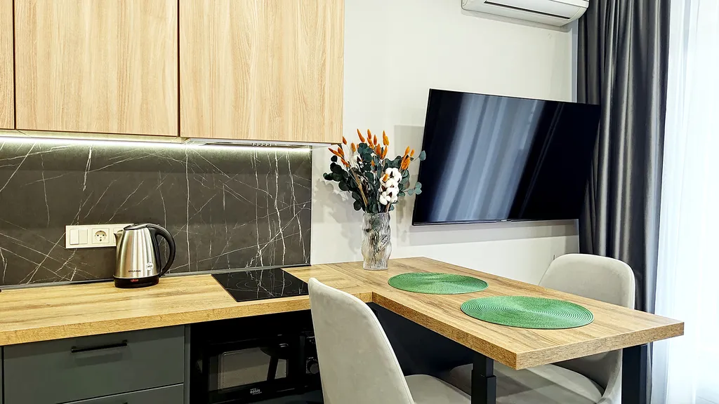 Студия с персональным выходом к шезлонгам - и вы любуетесь горами