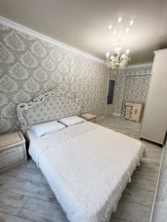 Апартамент с видом на море и на колесо обозрения