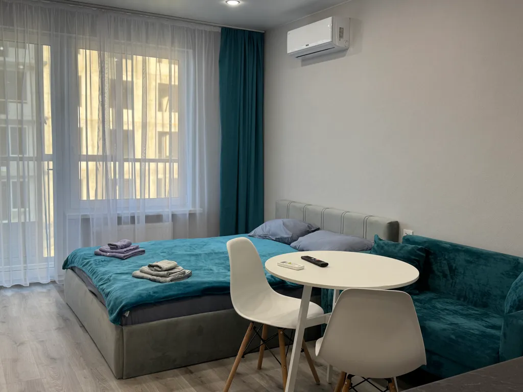 Уютная студия с видом на озеро