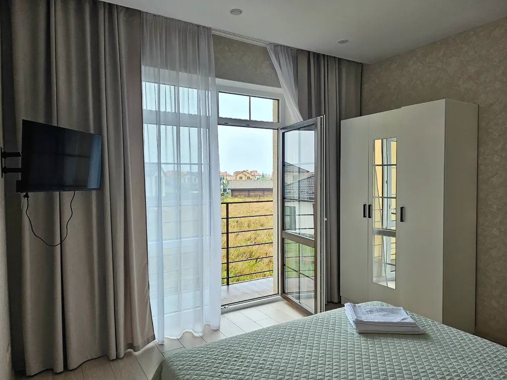 Домик у моря с зоной барбекю